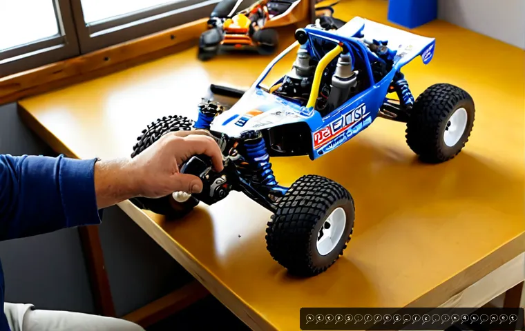 RC카 제작 과정과 재료 - Photorealistic overhead workshop scene showing the RC car building process: a partially assembled of...